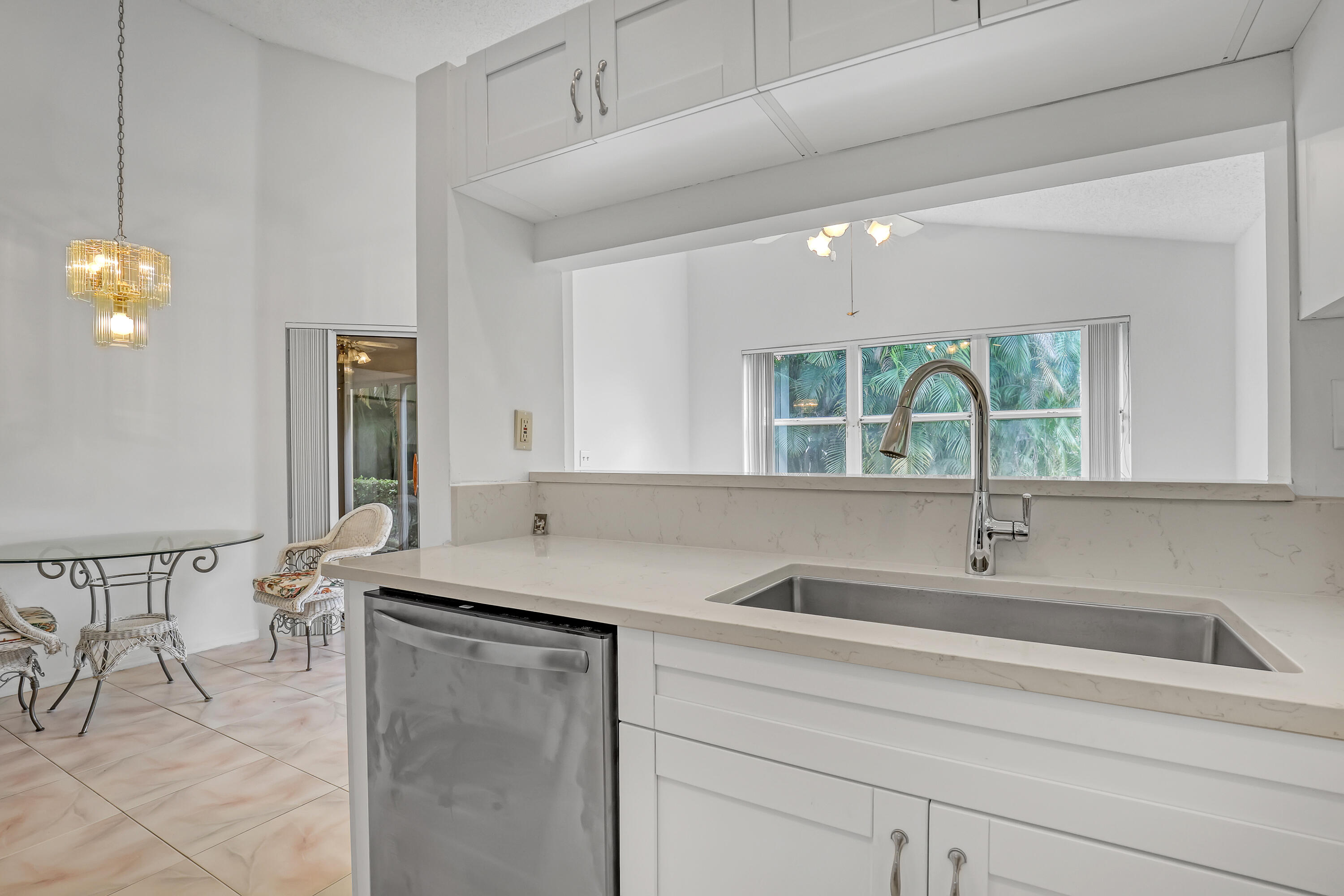11120 Rios Road Boca Raton, FL 33498 - Photo 18 of 36 a bathroom with a sink and a mirror