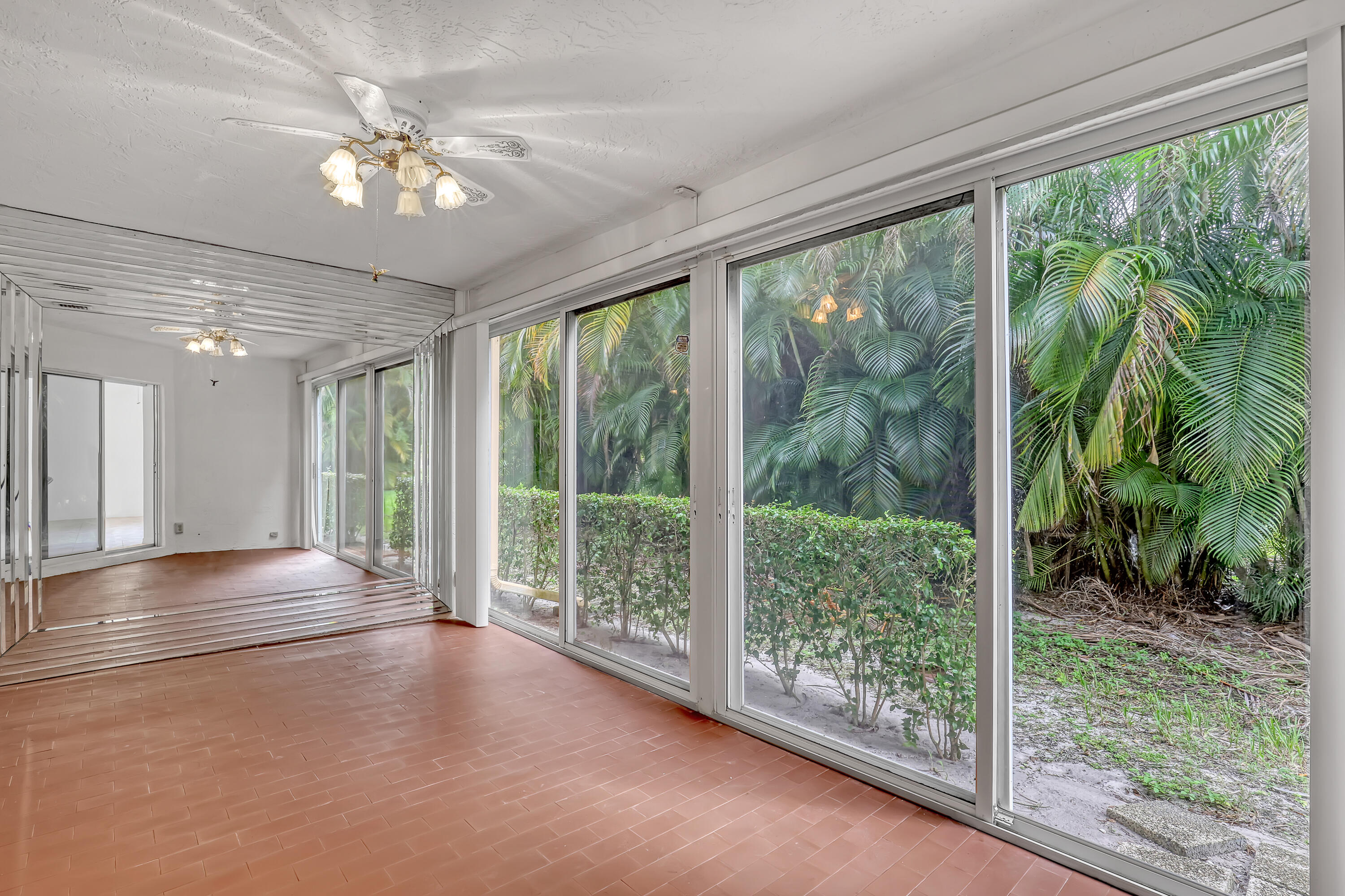 11120 Rios Road Boca Raton, FL 33498 - Photo 19 of 36 a view of a room with balcony and furniture