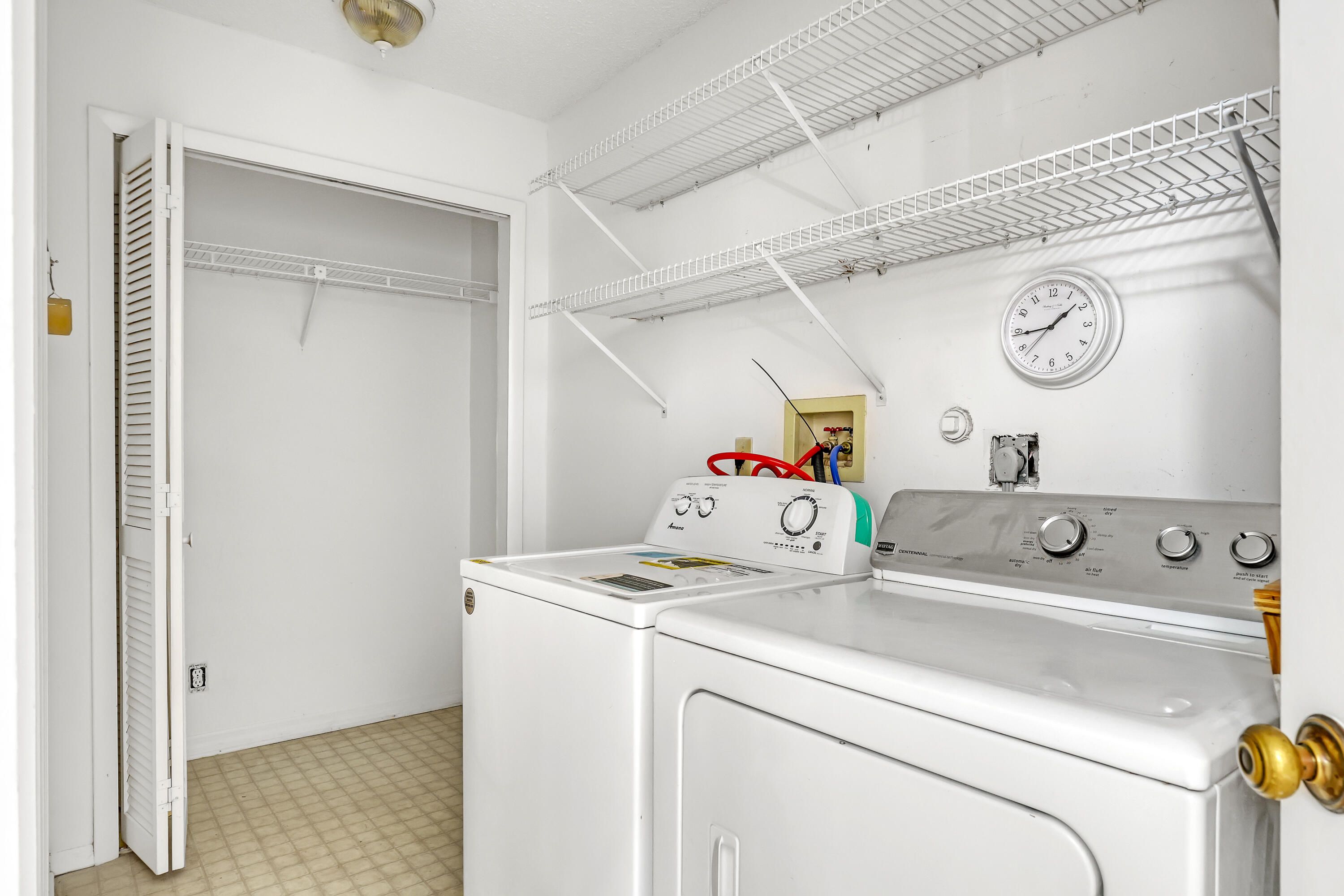 11120 Rios Road Boca Raton, FL 33498 - Photo 31 of 36 a utility room with dryer and washer