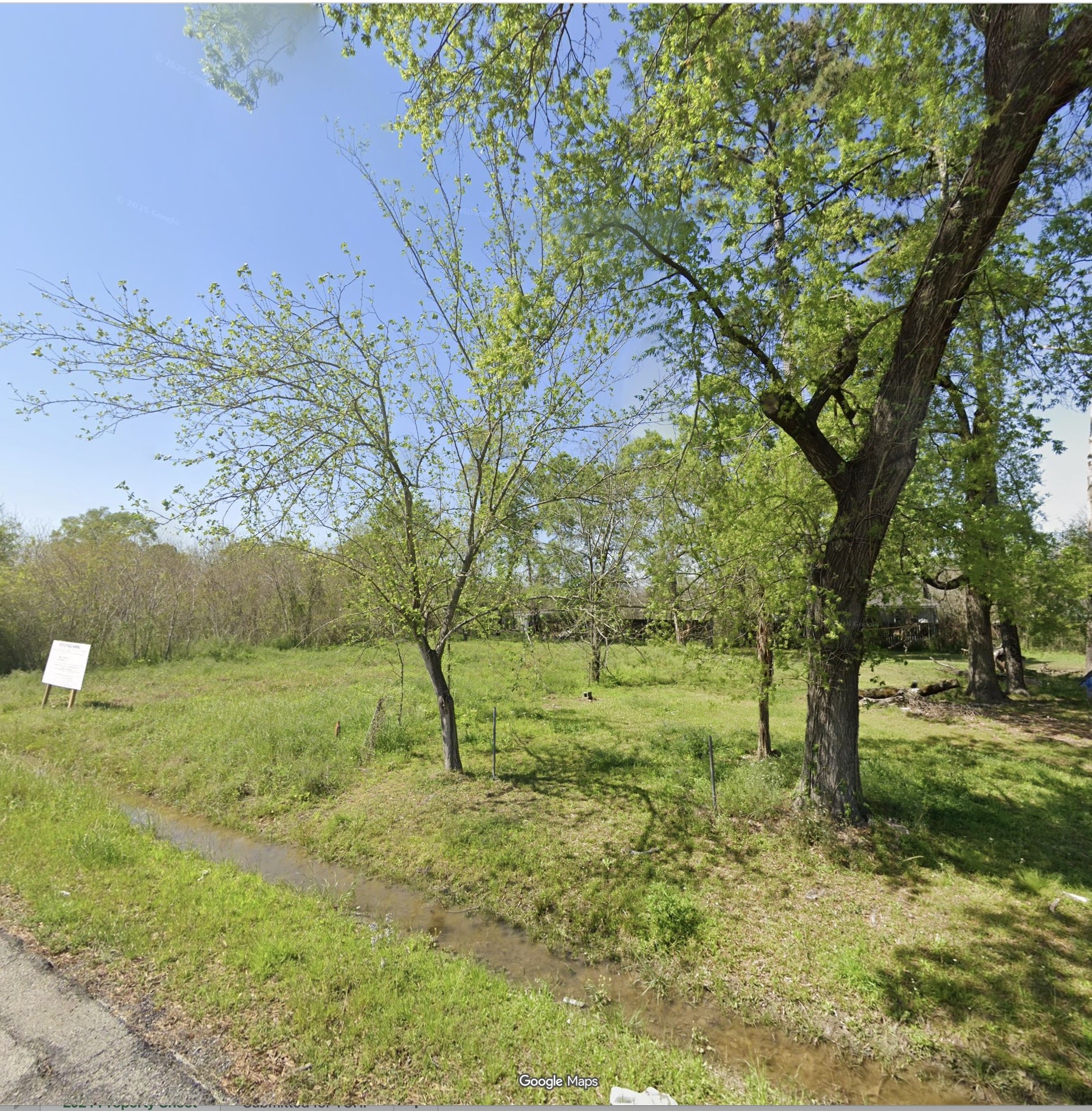8709 Sunderland Road Houston, TX 77028 - Photo 2 of 3 a view of outdoor space with trees all around