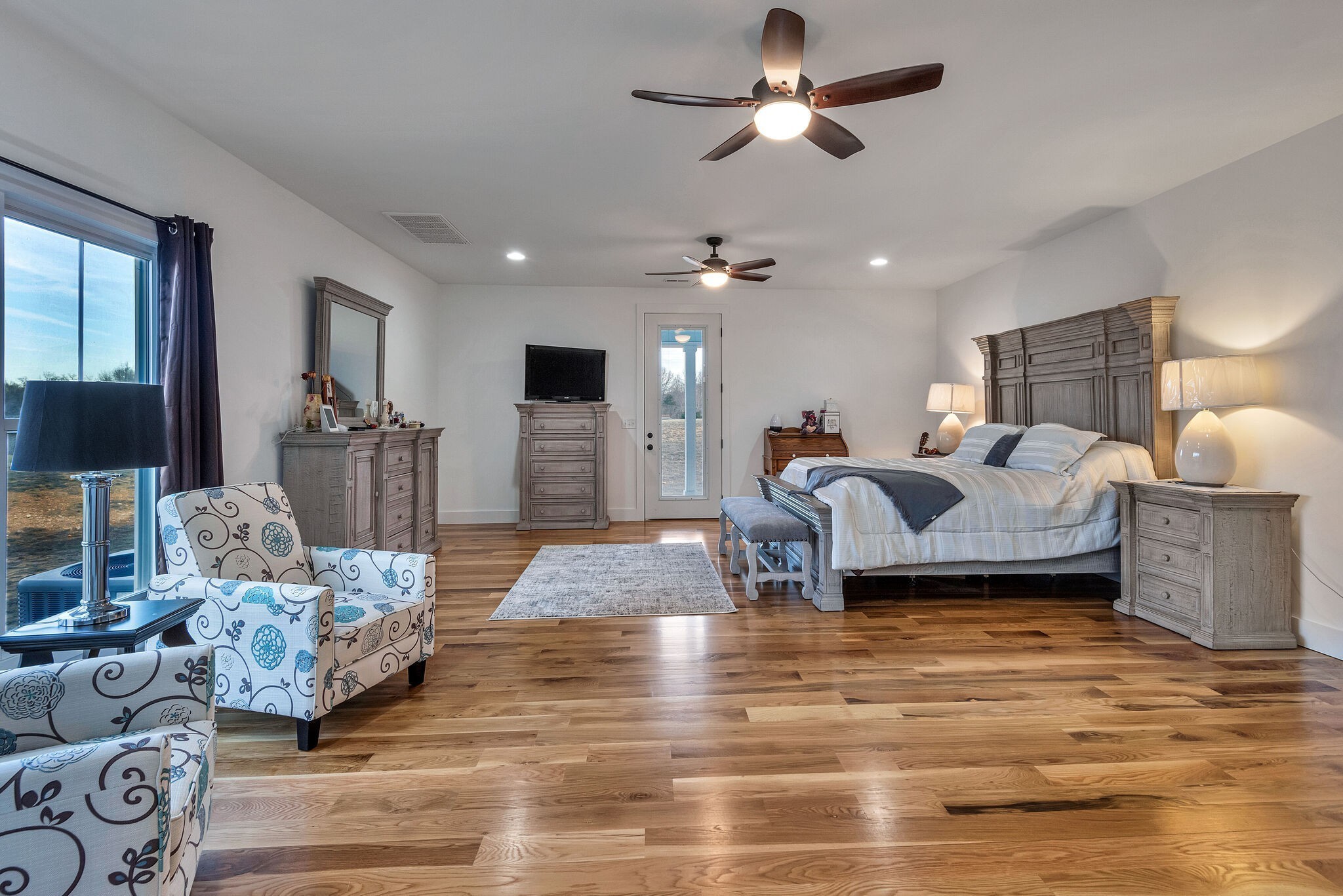 418 Lyle Lane Dickson, TN 37055 - Photo 25 of 51 a living room with furniture and a chandelier