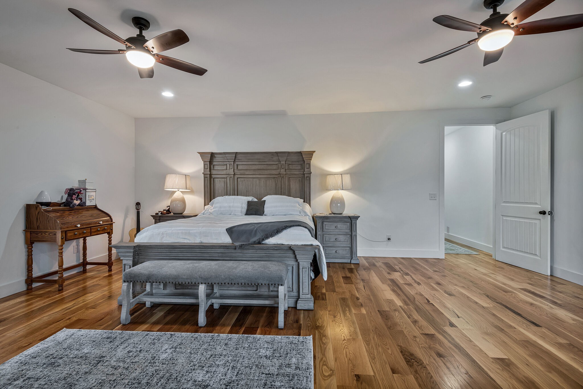 418 Lyle Lane Dickson, TN 37055 - Photo 26 of 51 a bed room with a bed and a chandelier