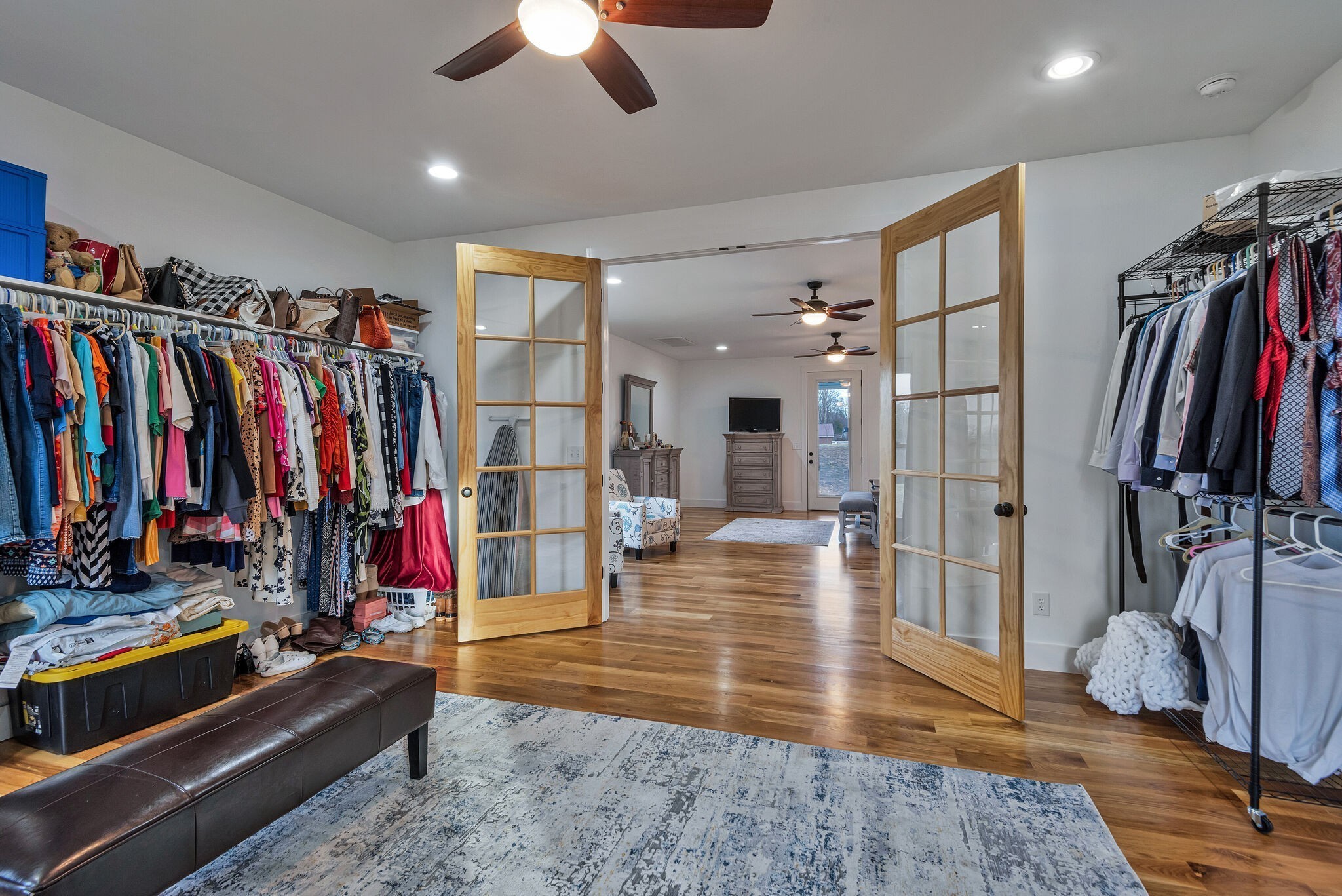 418 Lyle Lane Dickson, TN 37055 - Photo 28 of 51 a view of a living room with clothes and shoes