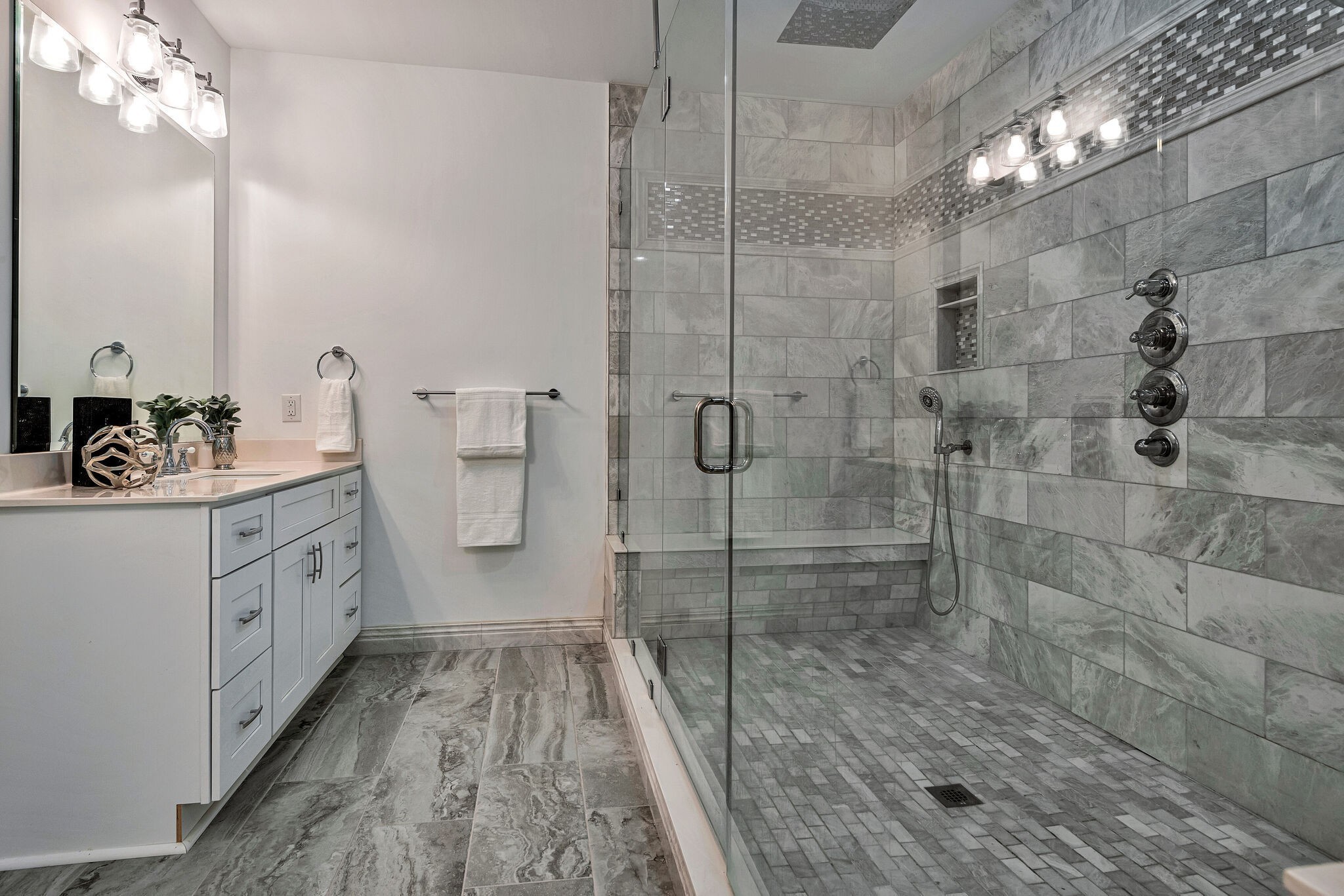 418 Lyle Lane Dickson, TN 37055 - Photo 31 of 51 a bathroom with a double vanity sink a toilet a mirror and shower