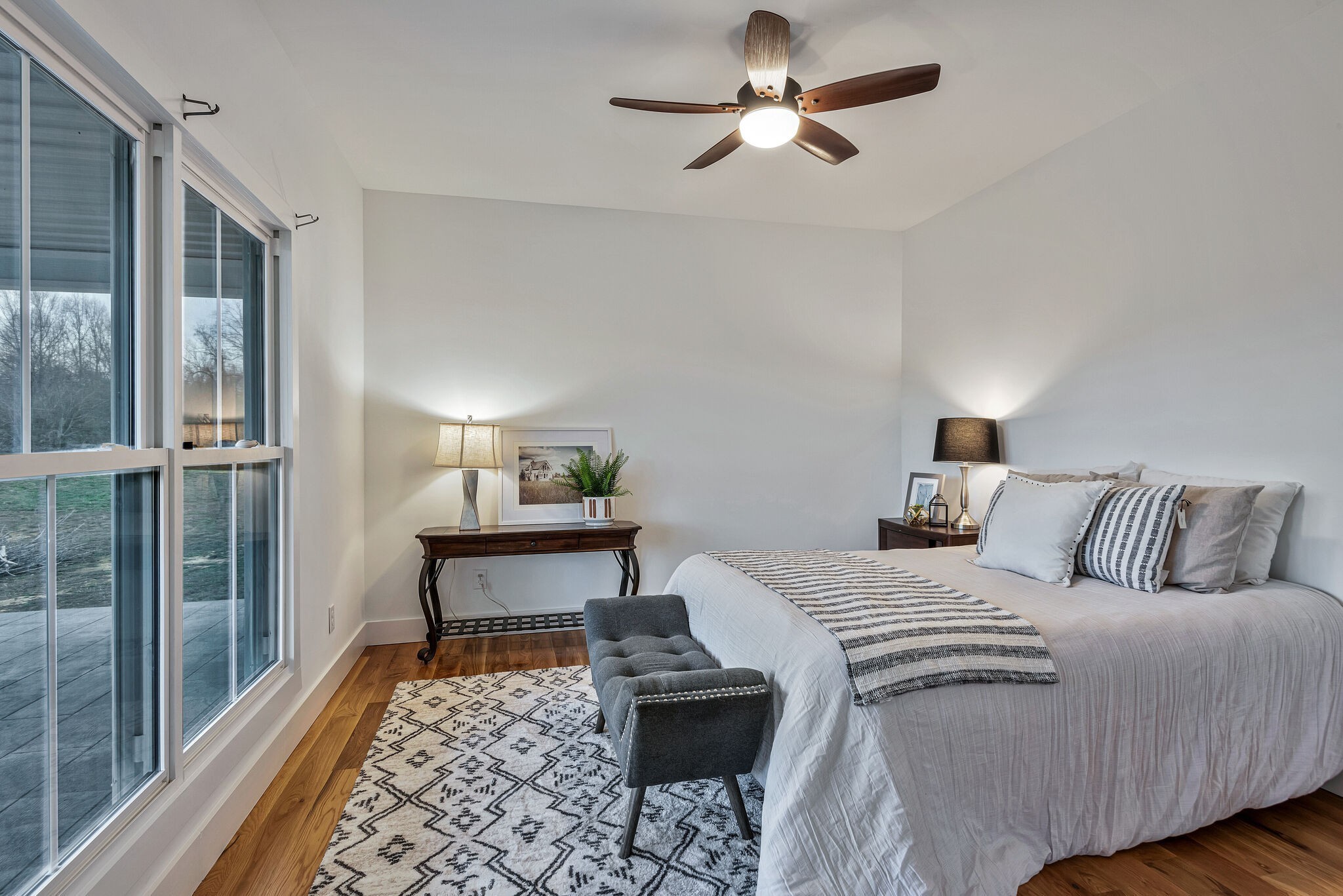 418 Lyle Lane Dickson, TN 37055 - Photo 32 of 51 a bedroom with a bed and a chandelier