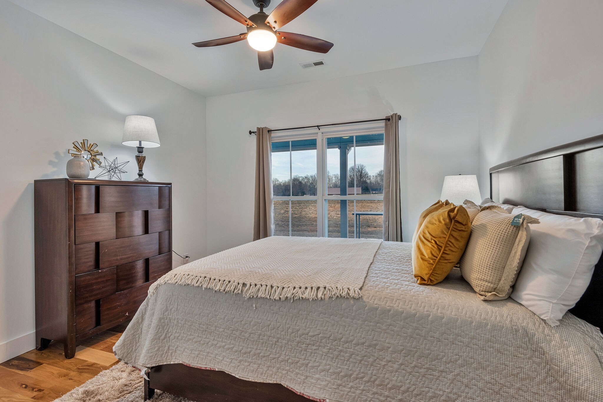 418 Lyle Lane Dickson, TN 37055 - Photo 34 of 51 a bedroom with a large bed and a window