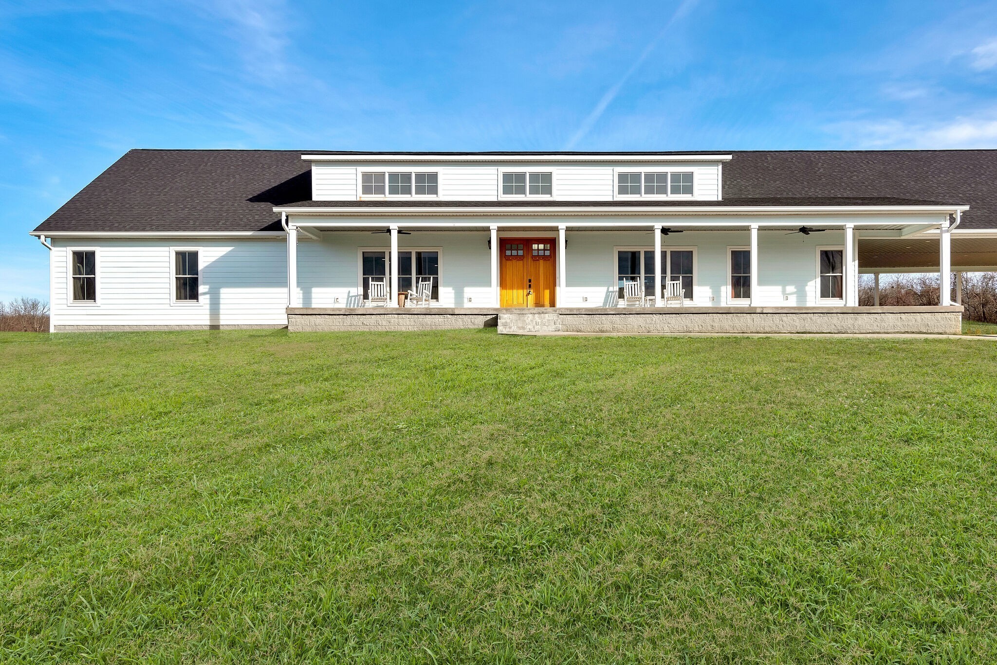 418 Lyle Lane Dickson, TN 37055 - Photo 42 of 51 a front view of a house with a garden