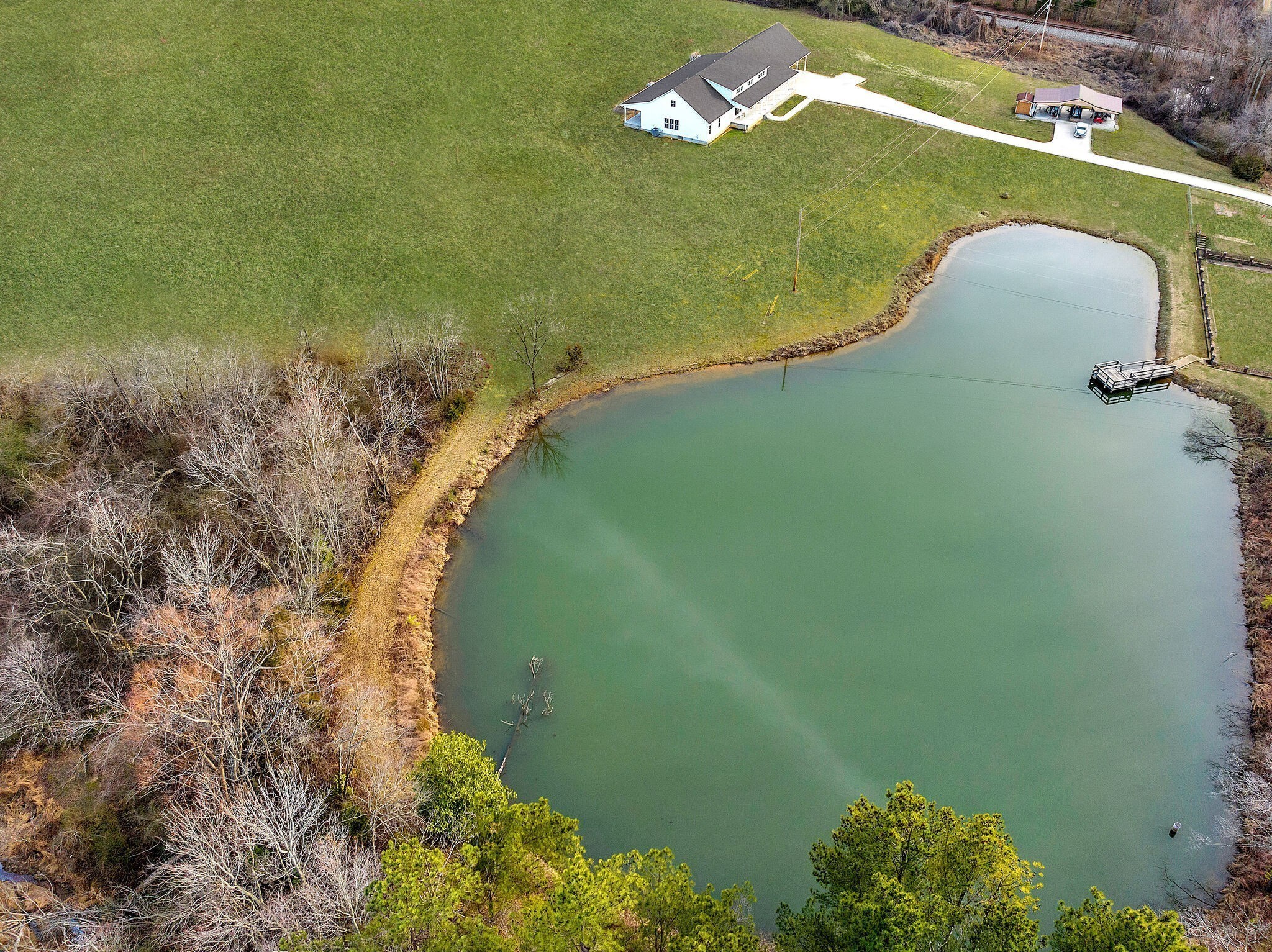 418 Lyle Lane Dickson, TN 37055 - Photo 43 of 51 a view of a lake with a yard