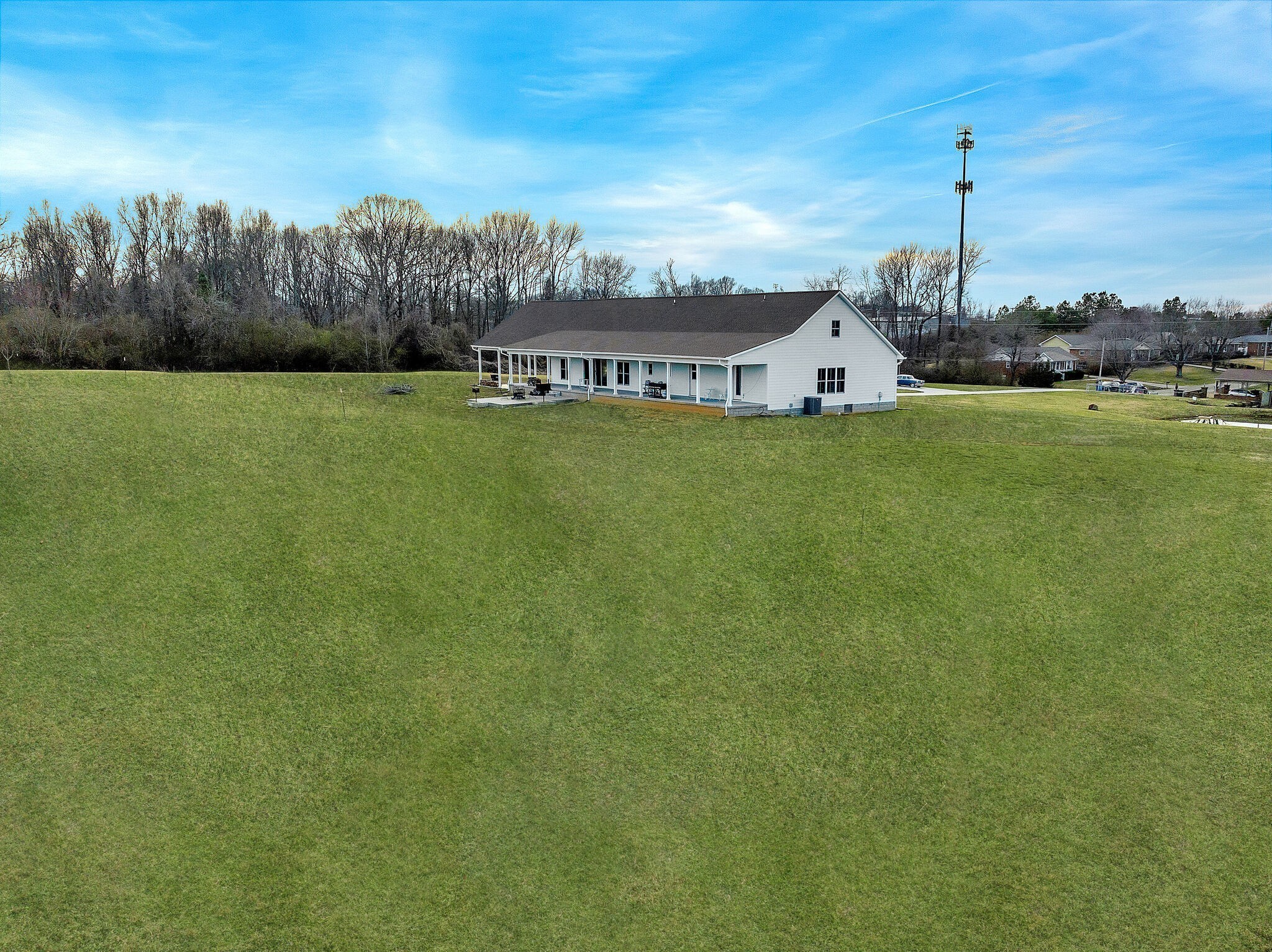 418 Lyle Lane Dickson, TN 37055 - Photo 47 of 51 a view of a house with a big yard and a large trees