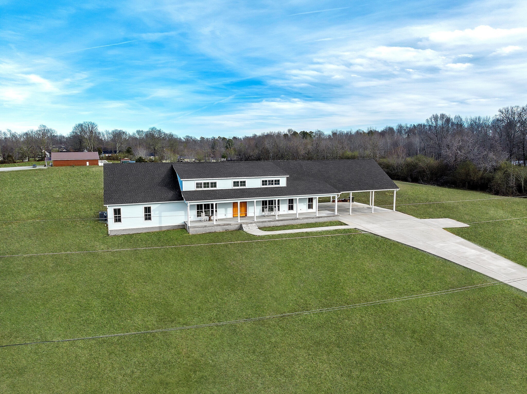 418 Lyle Lane Dickson, TN 37055 - Photo 5 of 51 a view of a lake with a big yard