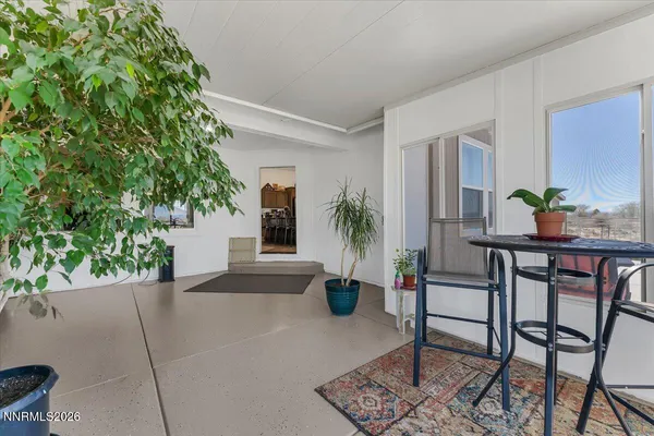 a view of a terrace with sitting area