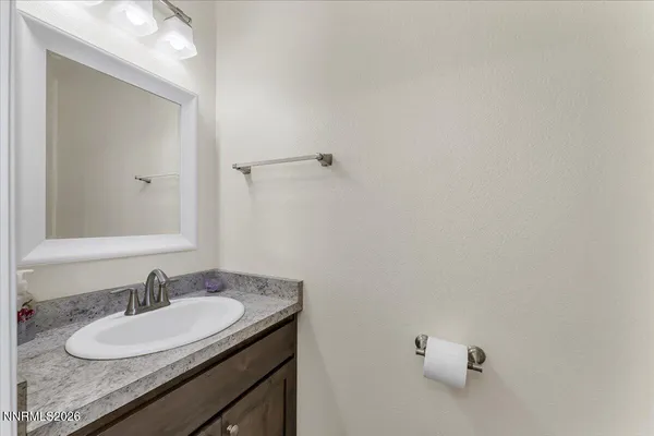 a view of a swimming pool with a yard