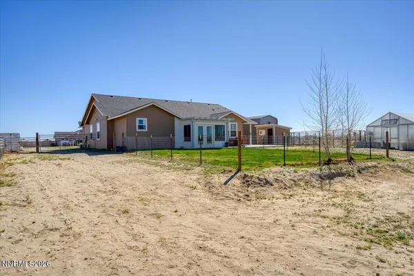 a view of a house with patio