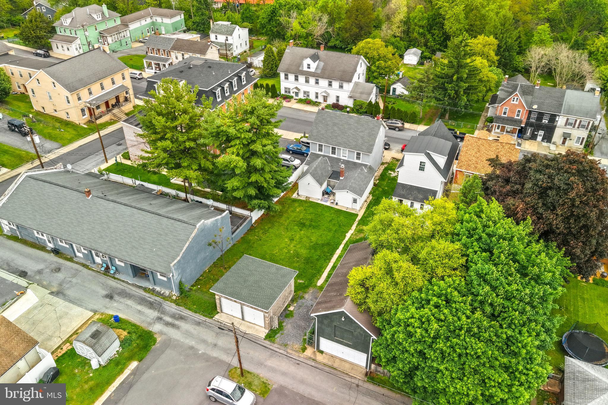 12 South Front Street Coplay, PA 18037 - Photo 40 of 42 an aerial view of a house with a garden and trees