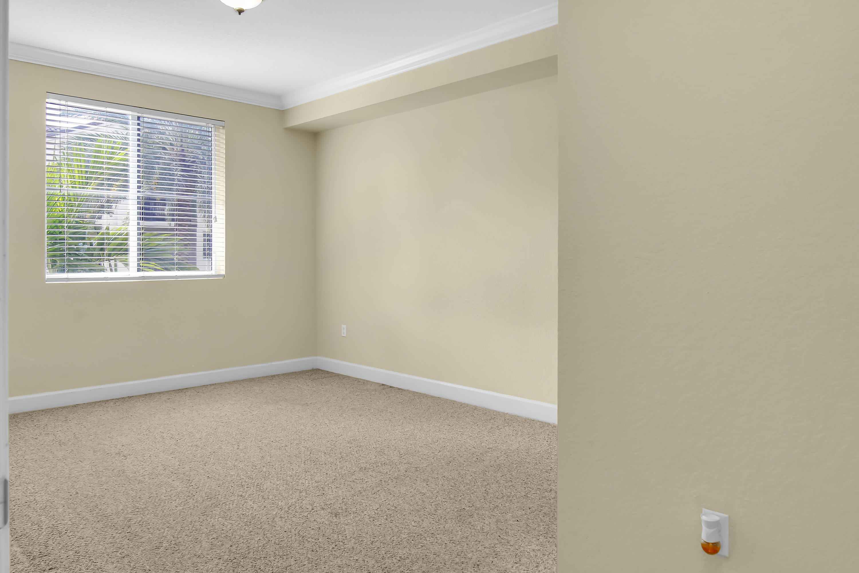 1690 Renaissance Commons Boulevard Boynton Beach, FL 33426 - Photo 7 of 22 an empty room with a window