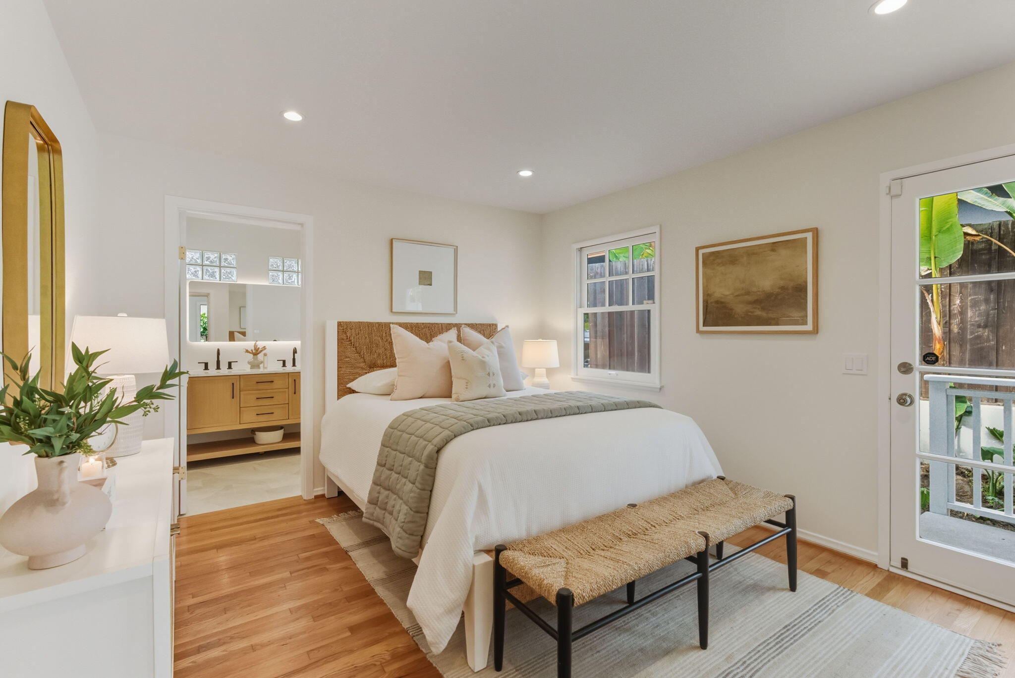 220 Santa Rosa Place Santa Barbara, CA 93109 - Photo 11 of 35 a spacious bedroom with a bed and a potted plant