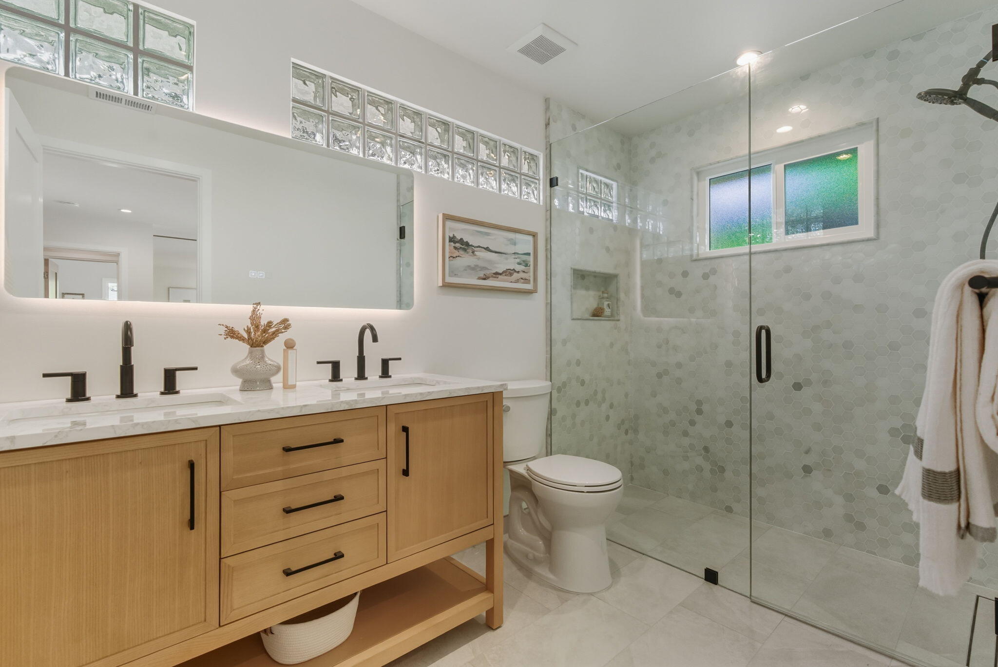220 Santa Rosa Place Santa Barbara, CA 93109 - Photo 12 of 35 a bathroom with a sink toilet and shower