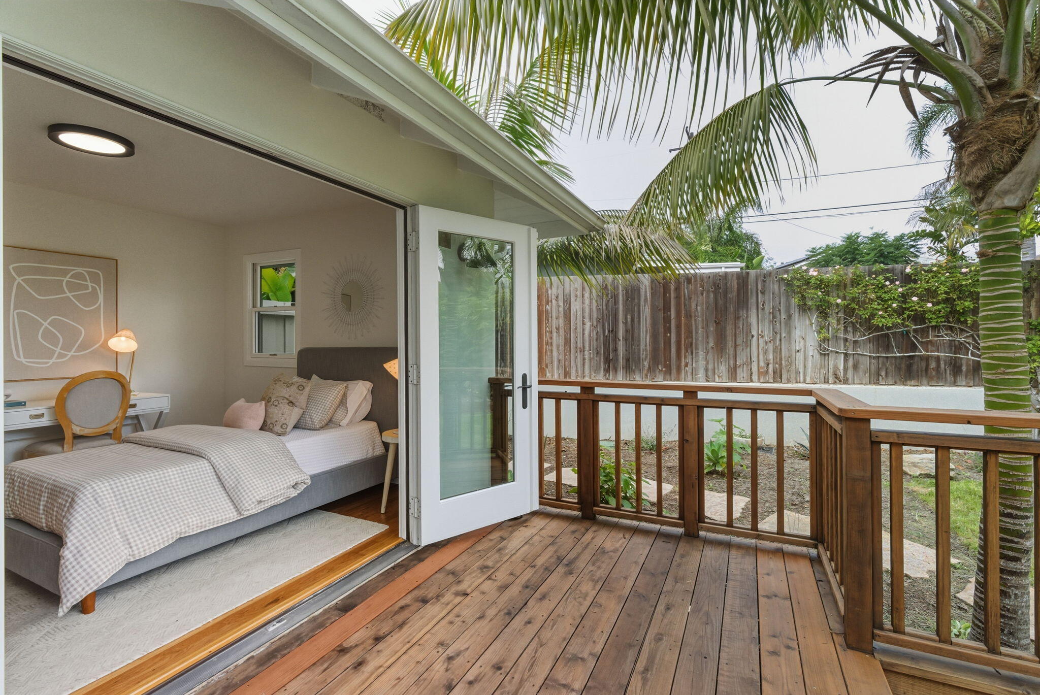 220 Santa Rosa Place Santa Barbara, CA 93109 - Photo 15 of 35 a bedroom with a bed and a large window