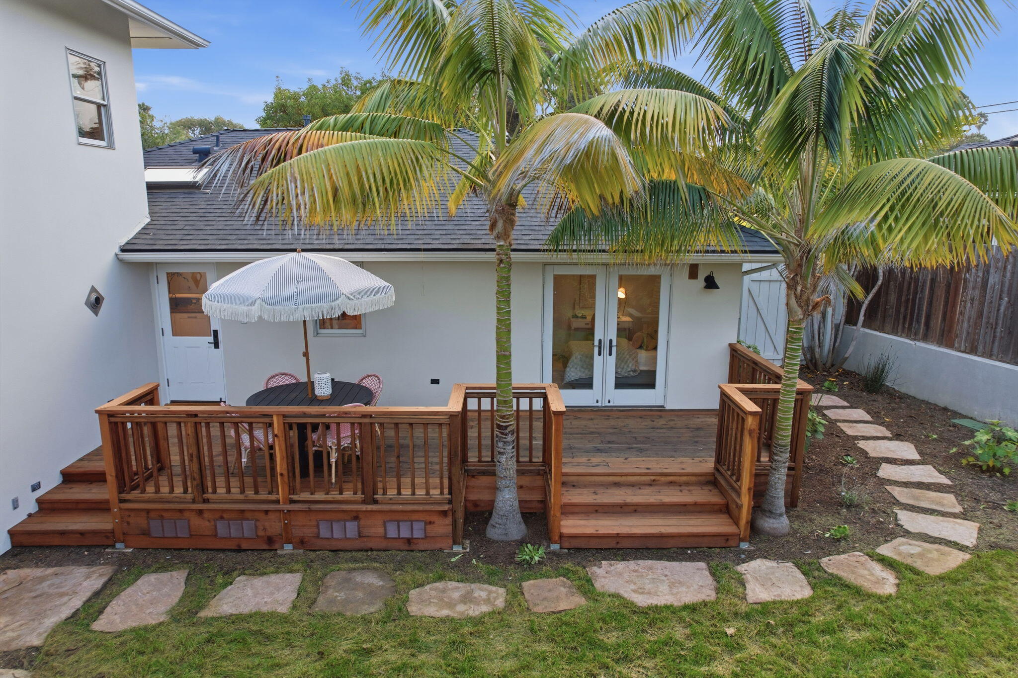 220 Santa Rosa Place Santa Barbara, CA 93109 - Photo 16 of 35 a view of a house with backyard and swimming pool