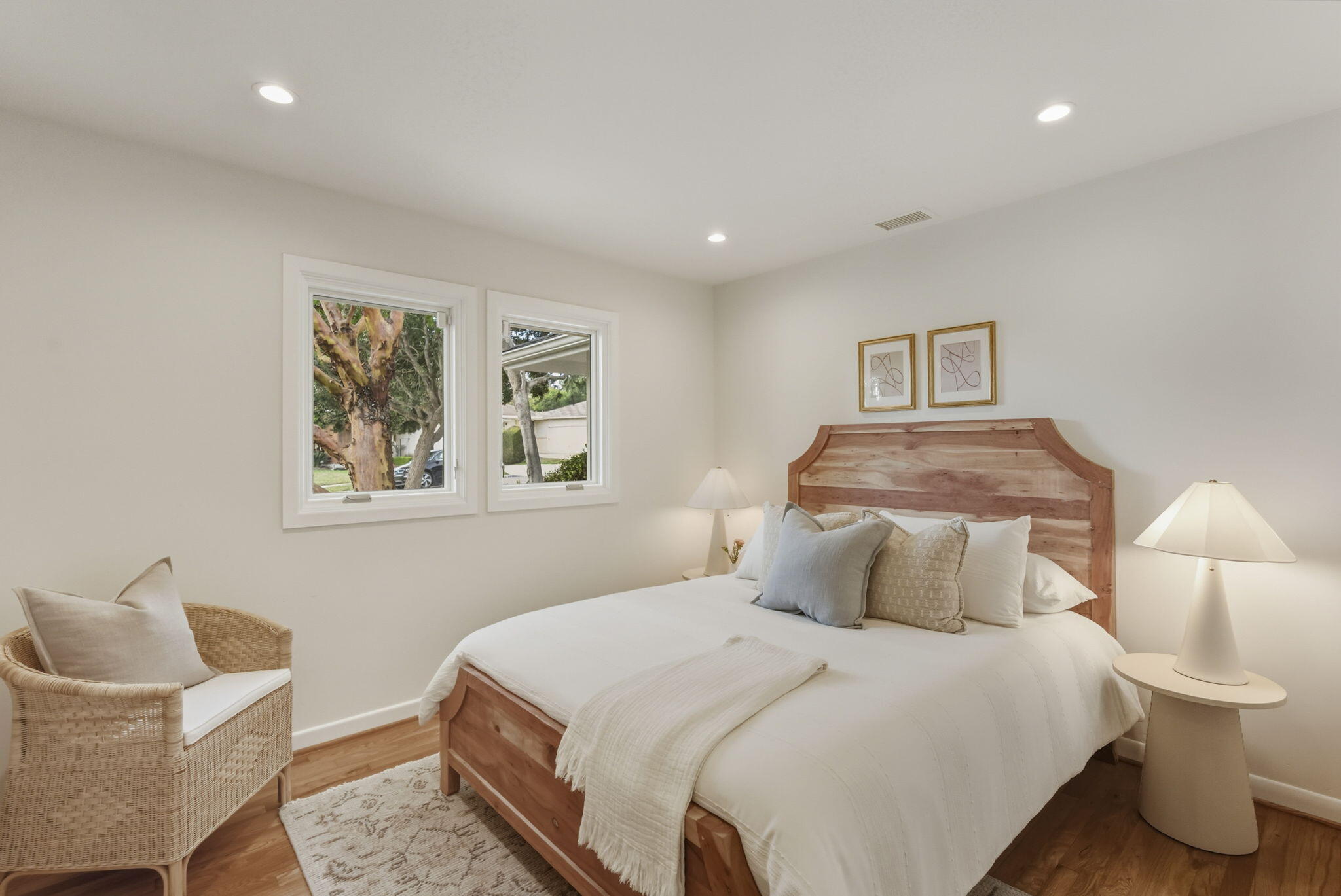 220 Santa Rosa Place Santa Barbara, CA 93109 - Photo 17 of 35 a bedroom with a bed and a chair