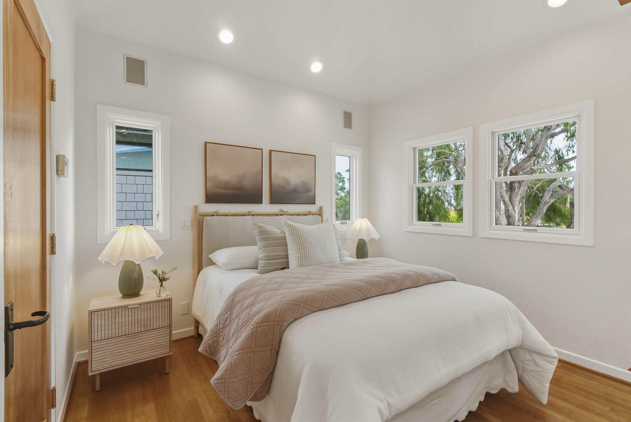 220 Santa Rosa Place Santa Barbara, CA 93109 - Photo 22 of 35 a bedroom with a bed and a flat screen tv