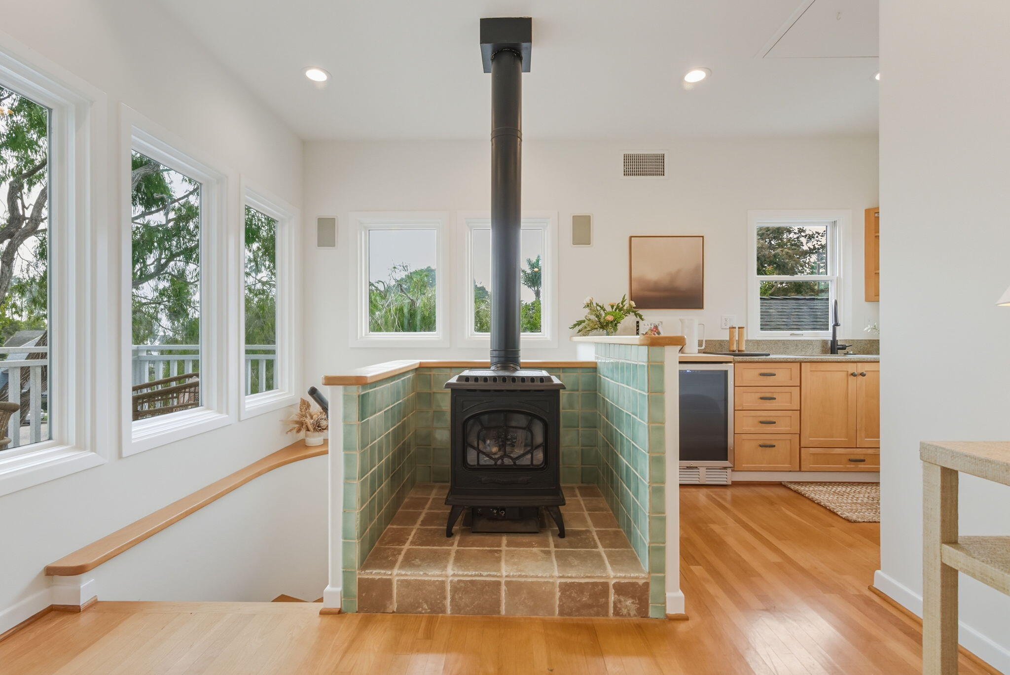 220 Santa Rosa Place Santa Barbara, CA 93109 - Photo 25 of 35 a living room with a fireplace furniture and a large window