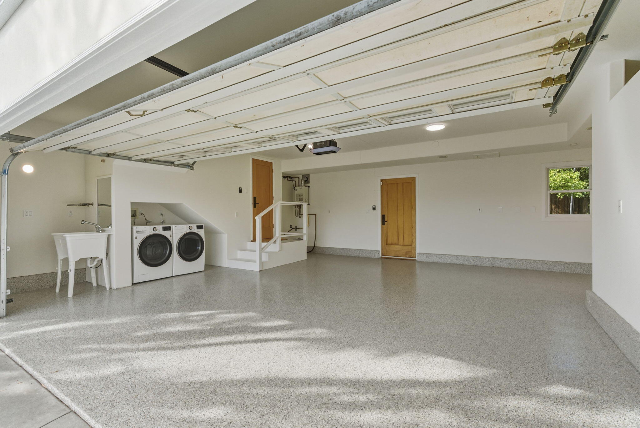220 Santa Rosa Place Santa Barbara, CA 93109 - Photo 28 of 35 a view of a hallway with washer and dryer