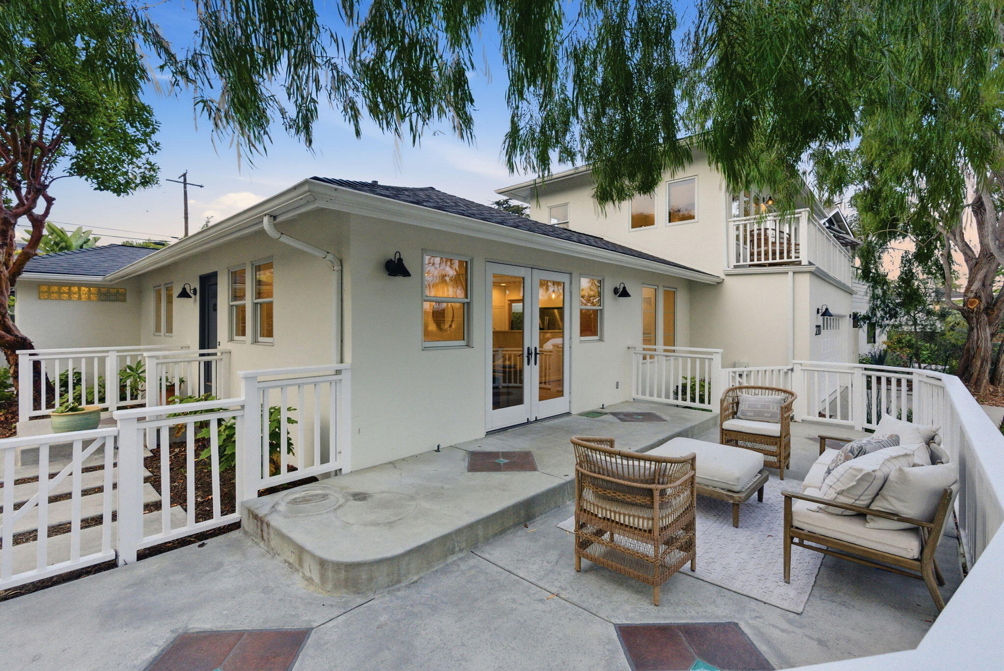 220 Santa Rosa Place Santa Barbara, CA 93109 - Photo 5 of 35 a backyard of a house with barbeque oven table and chairs