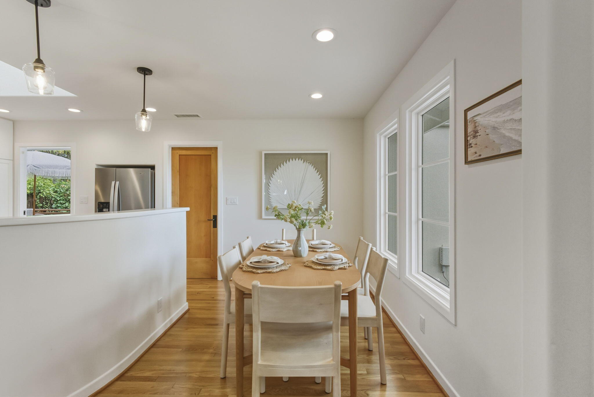 220 Santa Rosa Place Santa Barbara, CA 93109 - Photo 6 of 35 a view of a dining room with furniture window and wooden floor