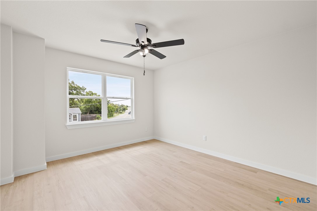 1204 Martin Luther King Jr Lane, Unit B Temple, TX 76504 - Photo 18 of 22 an empty room with a window