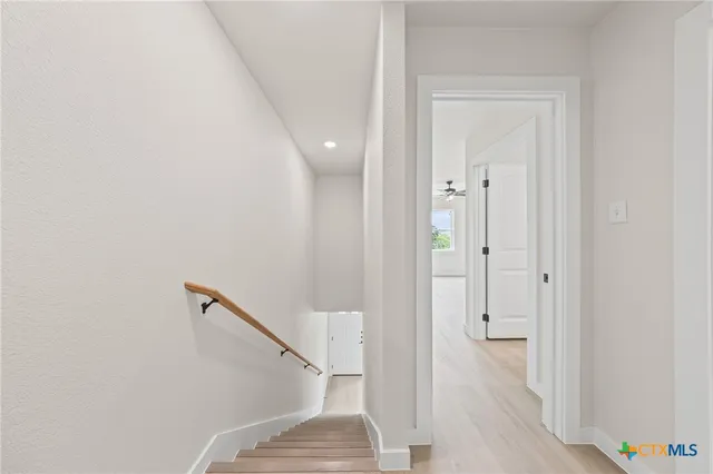 a view of a backyard of the house