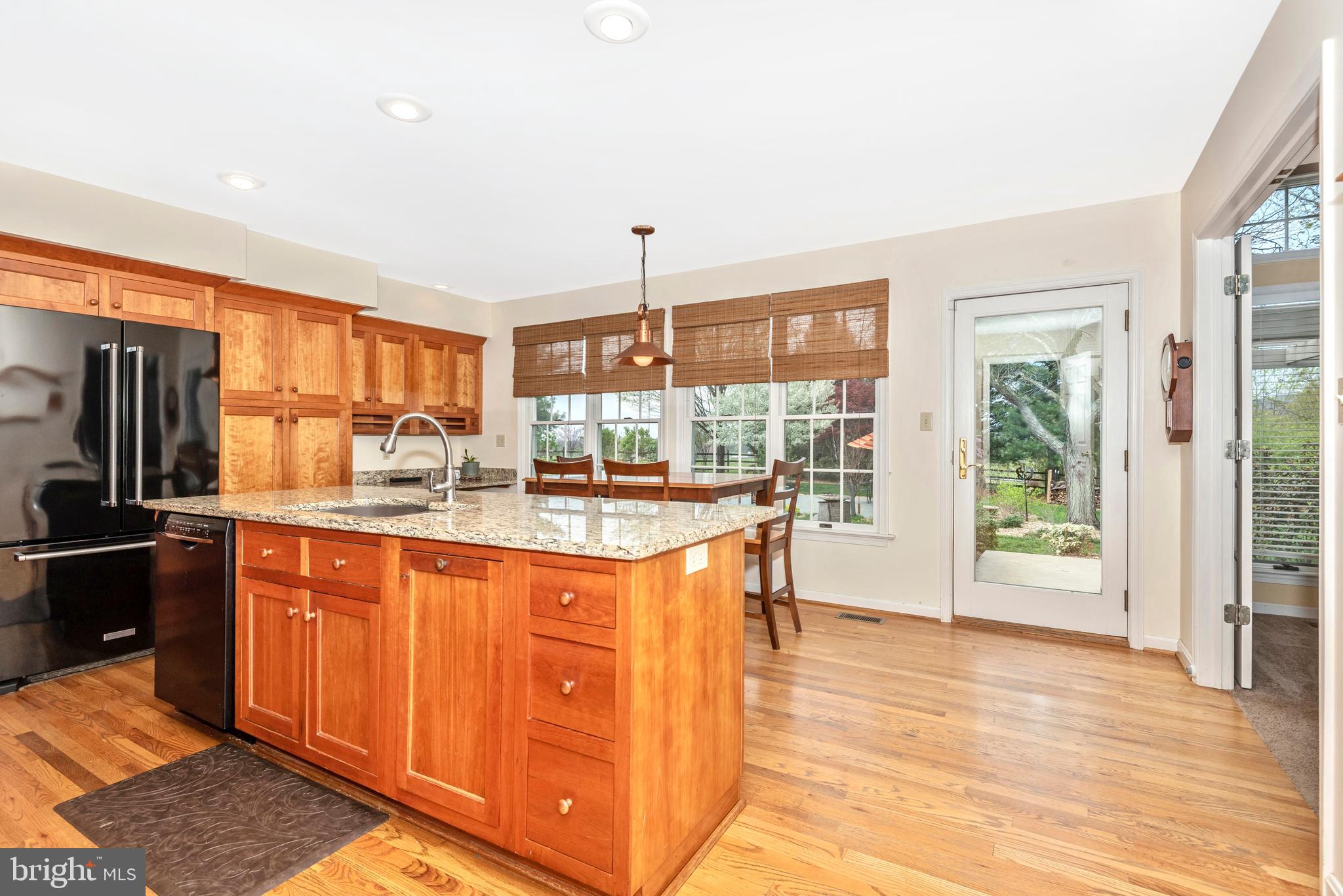8542 Pete Wiles Road Middletown, MD 21769 - Photo 12 of 77 The kitchen opens to the patio