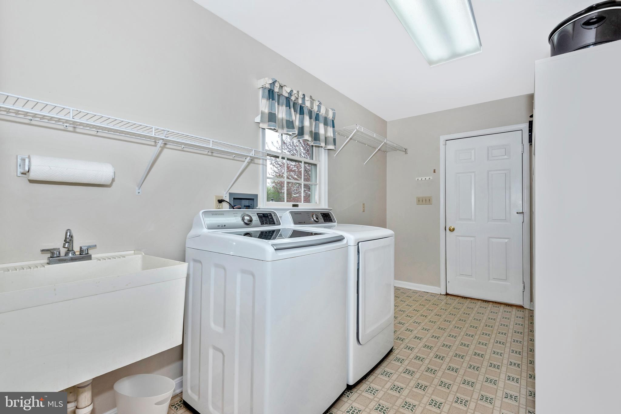 8542 Pete Wiles Road Middletown, MD 21769 - Photo 22 of 77 Main level laundry room and garage entry