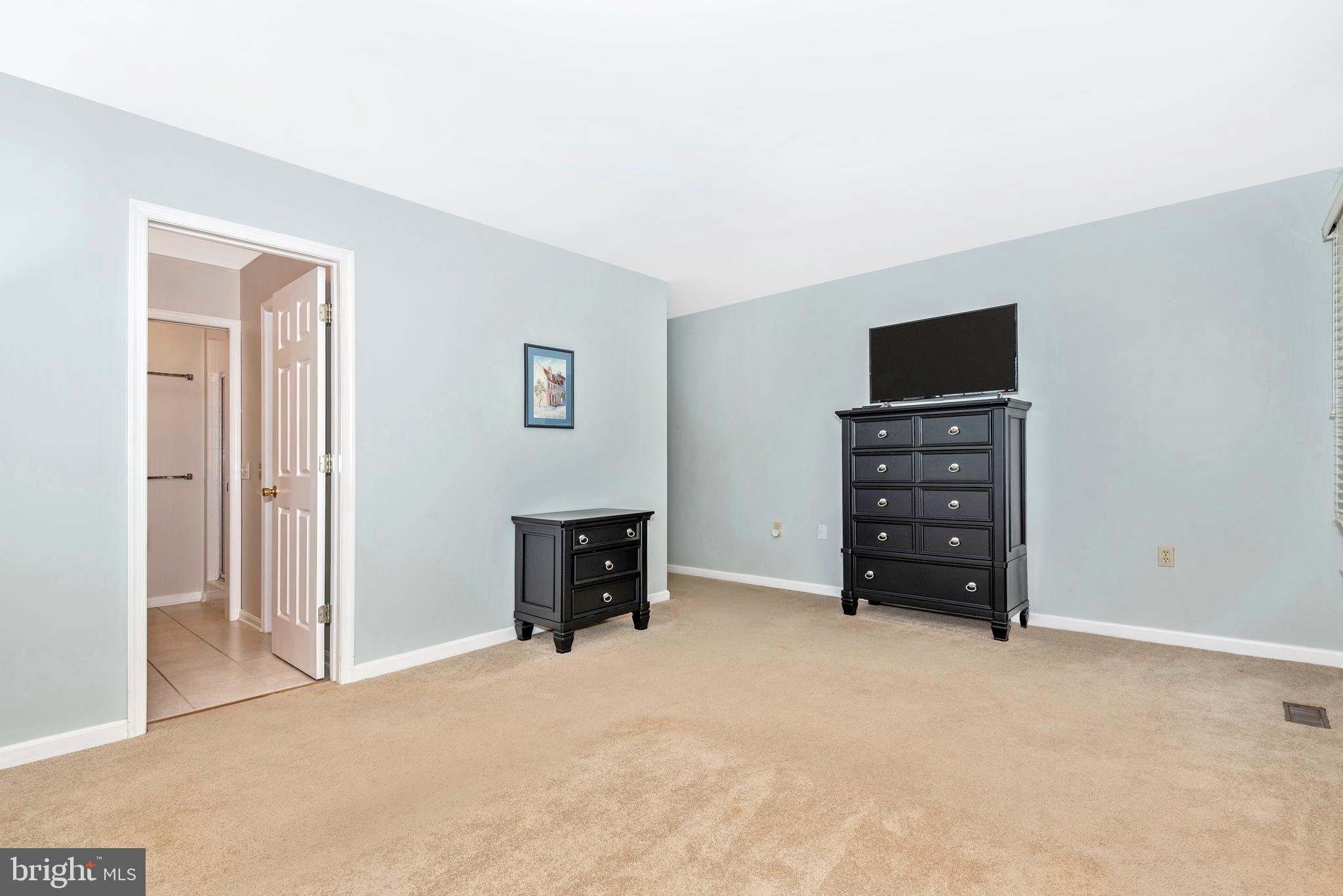 8542 Pete Wiles Road Middletown, MD 21769 - Photo 24 of 77 Main level owner's bedroom with a sitting area
