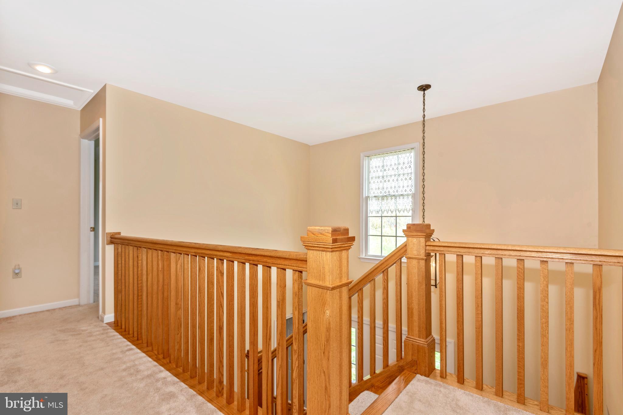 8542 Pete Wiles Road Middletown, MD 21769 - Photo 33 of 77 Second level stairway to the foyer
