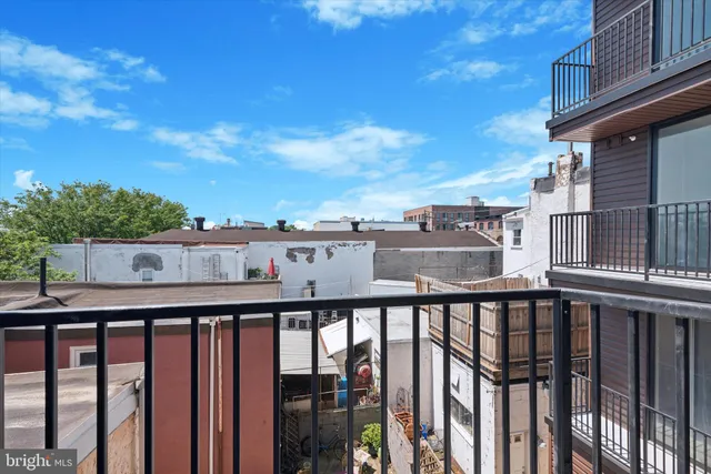 a view of city from a balcony