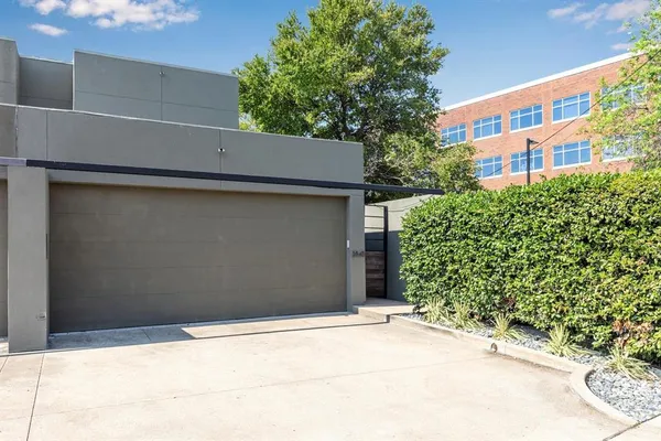 a house with a tree in front of it