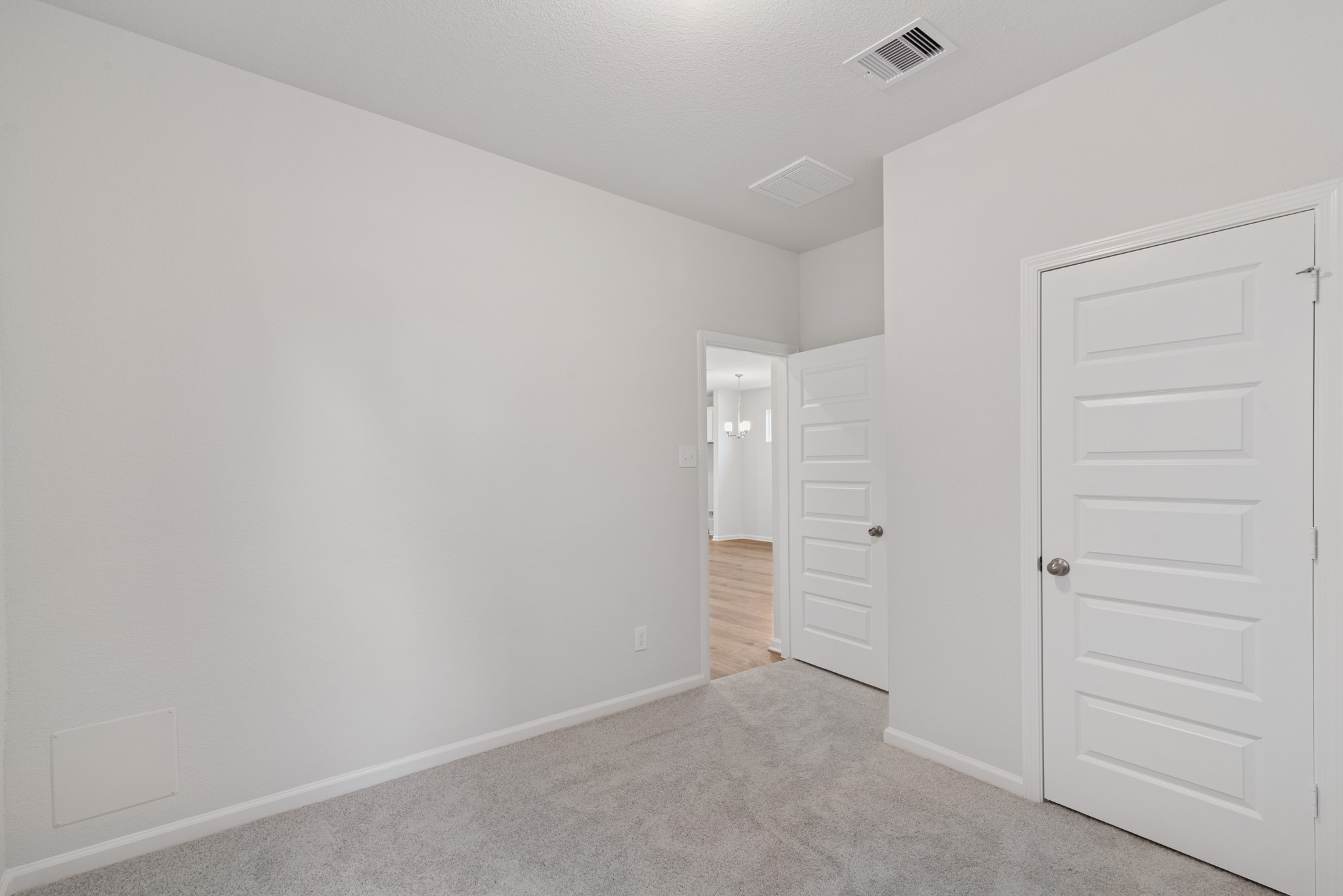 9793 Enclave Ridge Road Willis, TX 77318 - Photo 12 of 20 an empty room with closet area