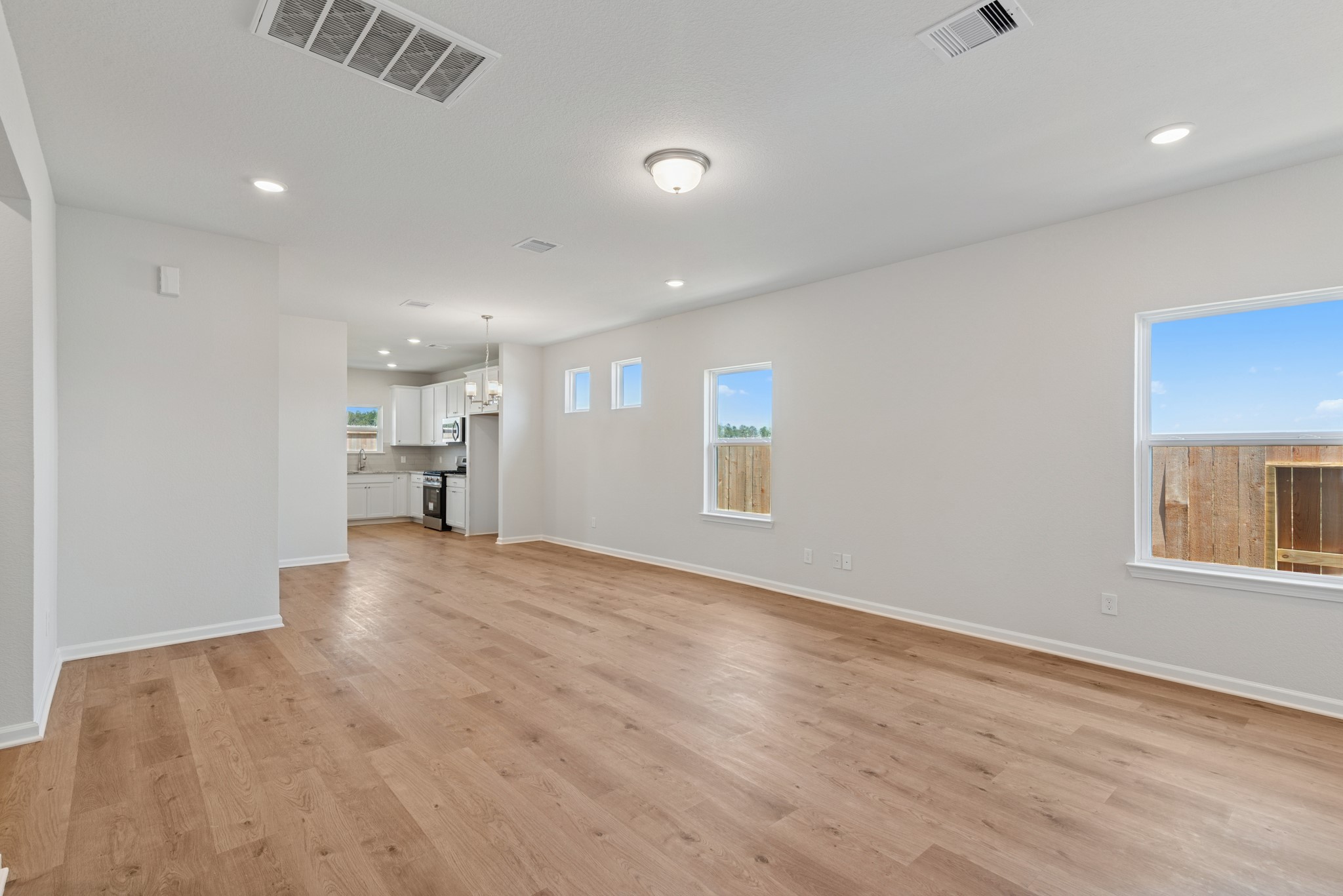 9793 Enclave Ridge Road Willis, TX 77318 - Photo 4 of 20 a view of a livingroom with a hardwood