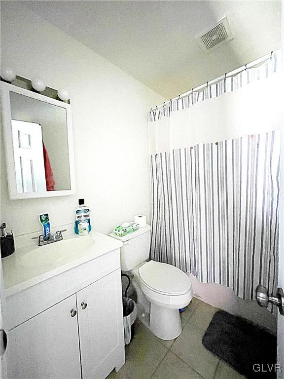 4160 Romeo Road Tobyhanna, PA 18466 - Photo 11 of 12 a bathroom with a toilet a sink and a mirror