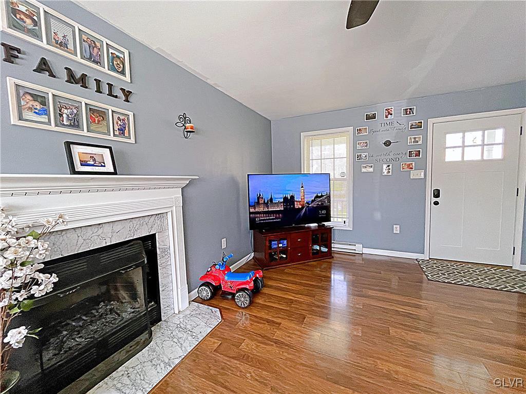 4160 Romeo Road Tobyhanna, PA 18466 - Photo 3 of 12 a living room with furniture and a fireplace