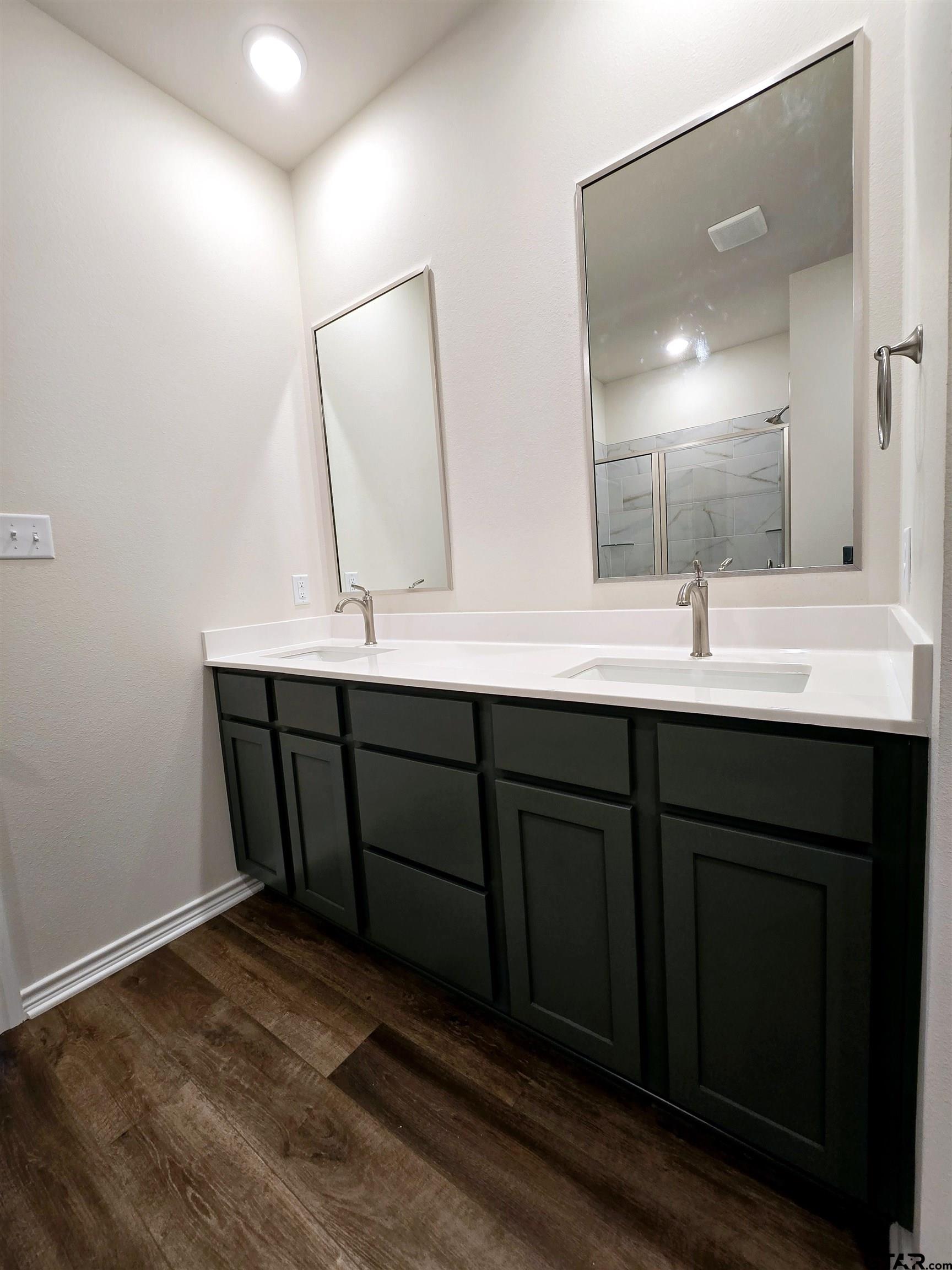 602 Kidd Drive Chandler, TX 75758 - Photo 17 of 22 a bathroom with a sink and a mirror