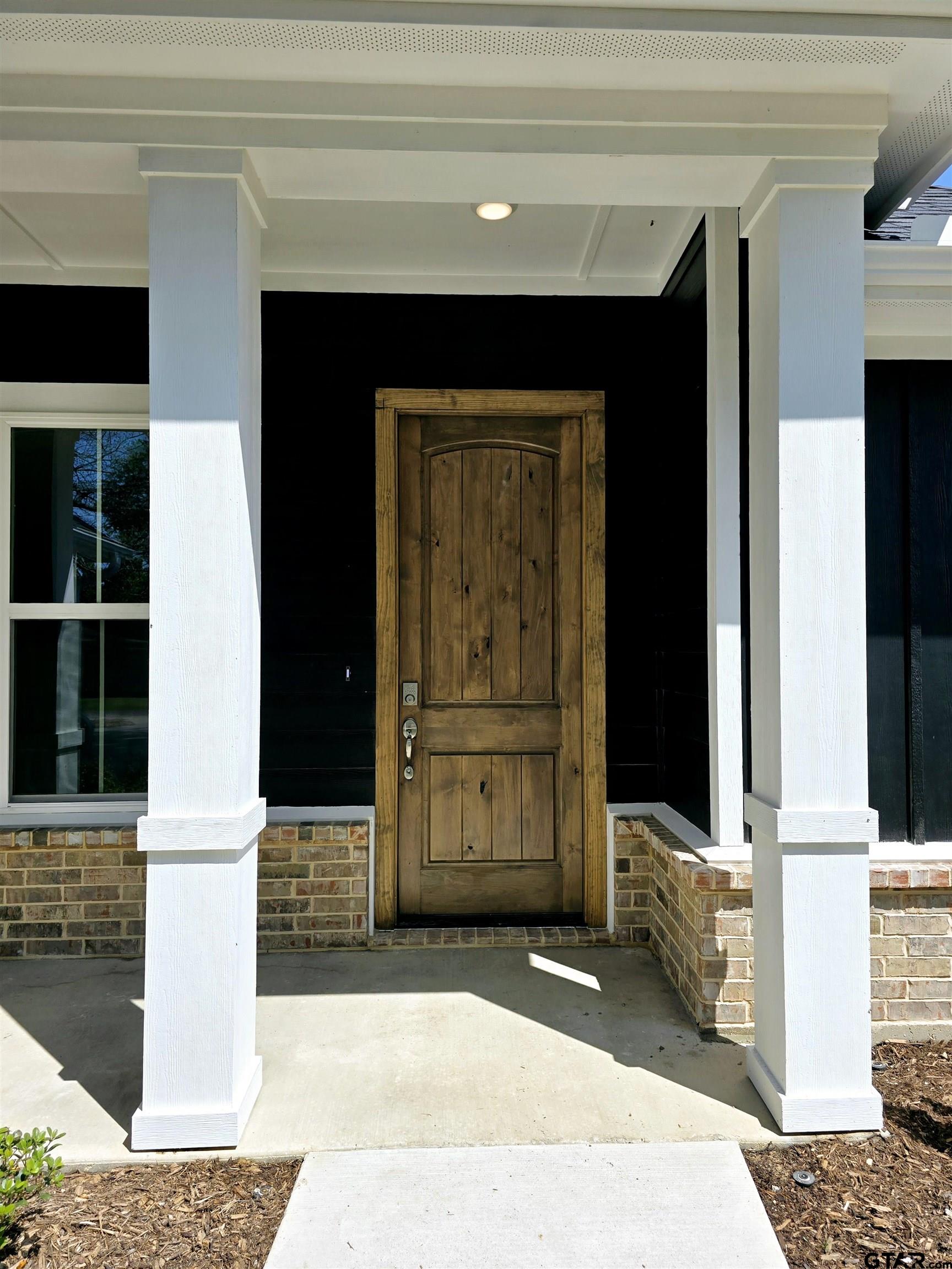 602 Kidd Drive Chandler, TX 75758 - Photo 2 of 22 a bedroom with a bed and a dresser