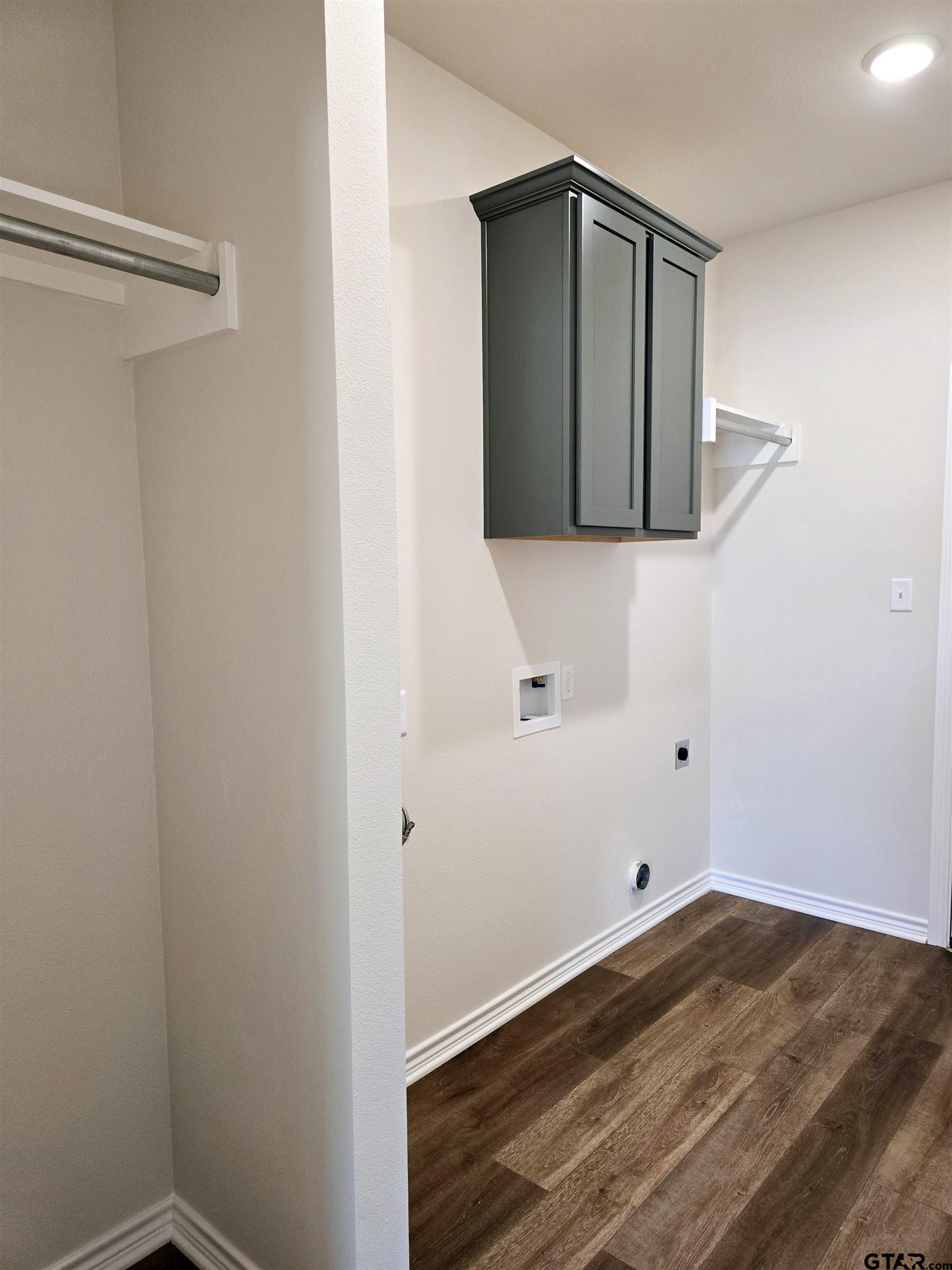602 Kidd Drive Chandler, TX 75758 - Photo 10 of 22 a view of storage and utility room with wooden floor