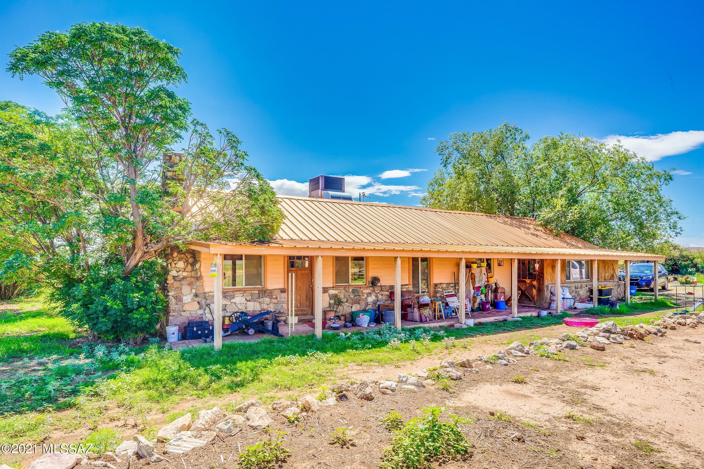 Main Home with lovely patio, many mature trees...,
