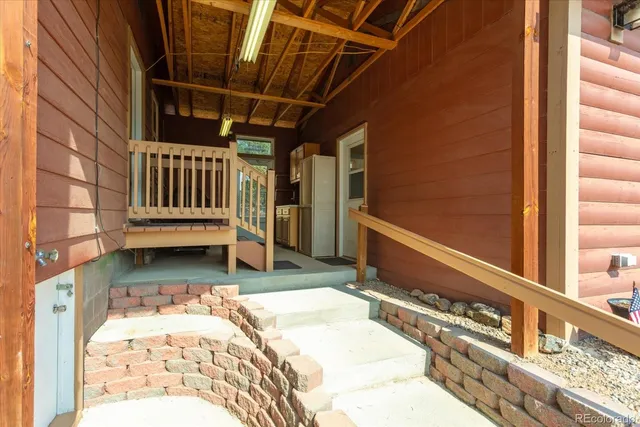a view of balcony with a small yard