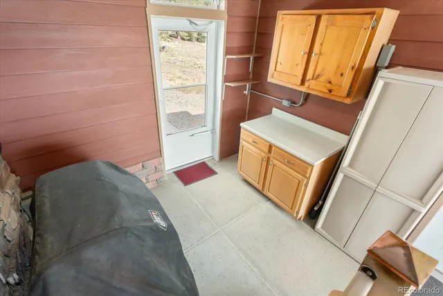 a view of a yard with a tree