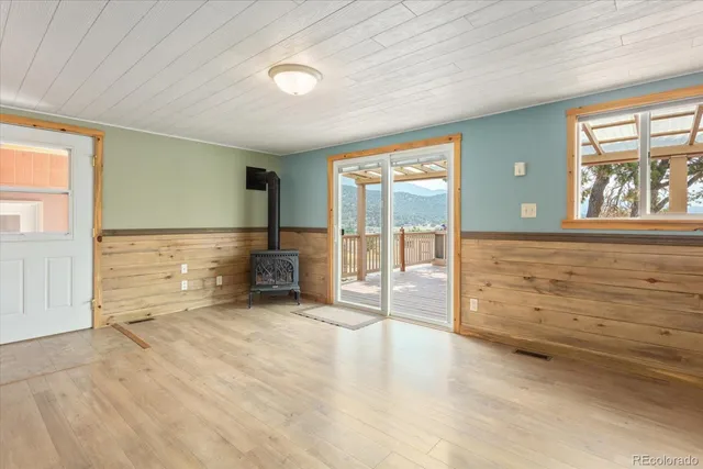 a view of an empty room and window