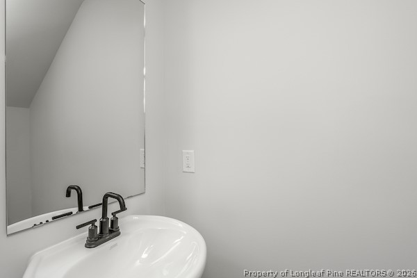 28 Rider Street Broadway, NC 27505 - Photo 13 of 22 a bathroom with a sink