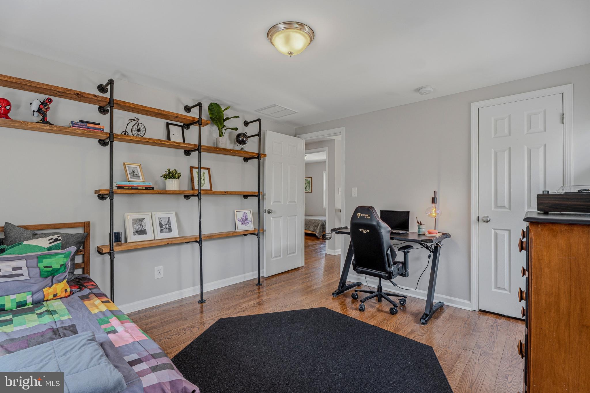 506 Brook Road Baltimore, MD 21286 - Photo 29 of 56 a view of a workspace with furniture and toys